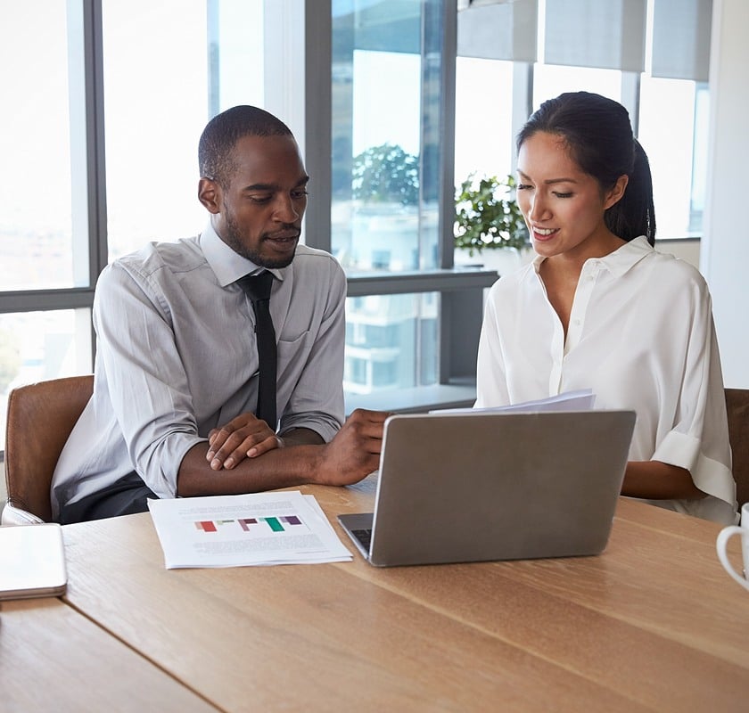 workers-at-table-with-computer