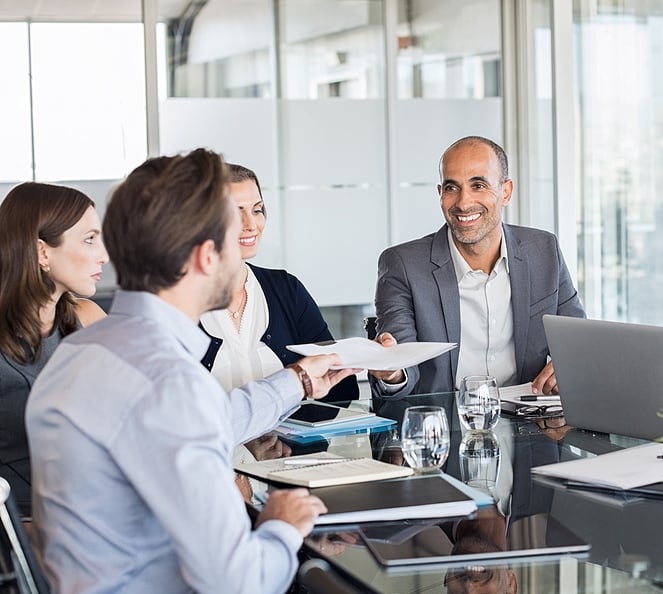 workers-at-table-conversating